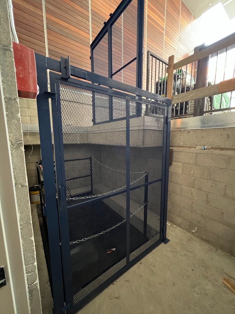 After service bay reliability upgrade with secure enclosed steel gate system