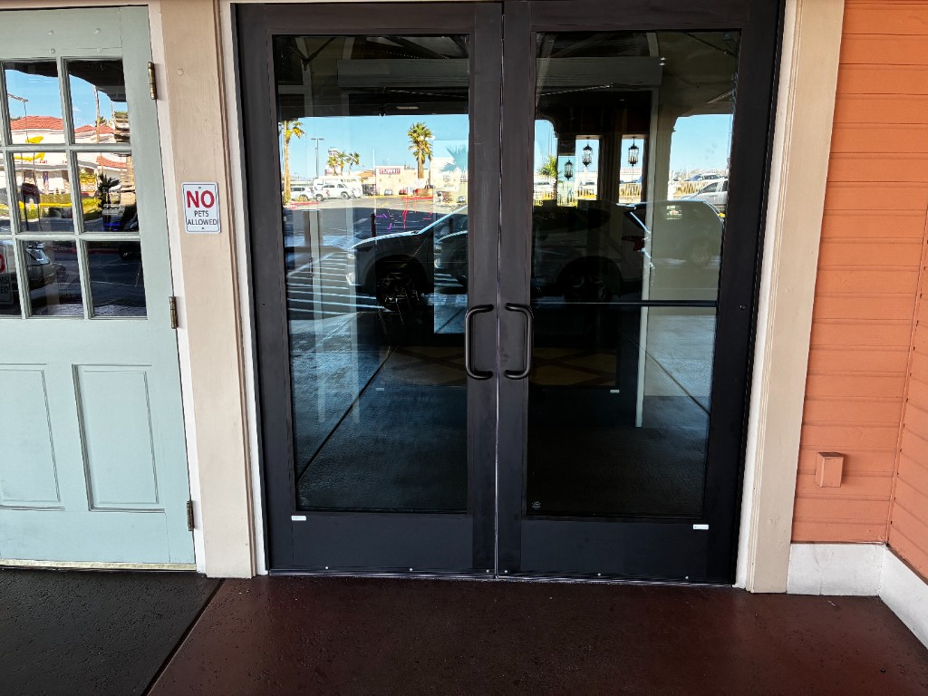 After storefront modernization with new aluminum and glass double-door entry